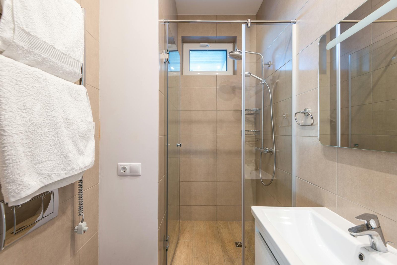 Well-maintained shower caddy with proper drainage and organized products