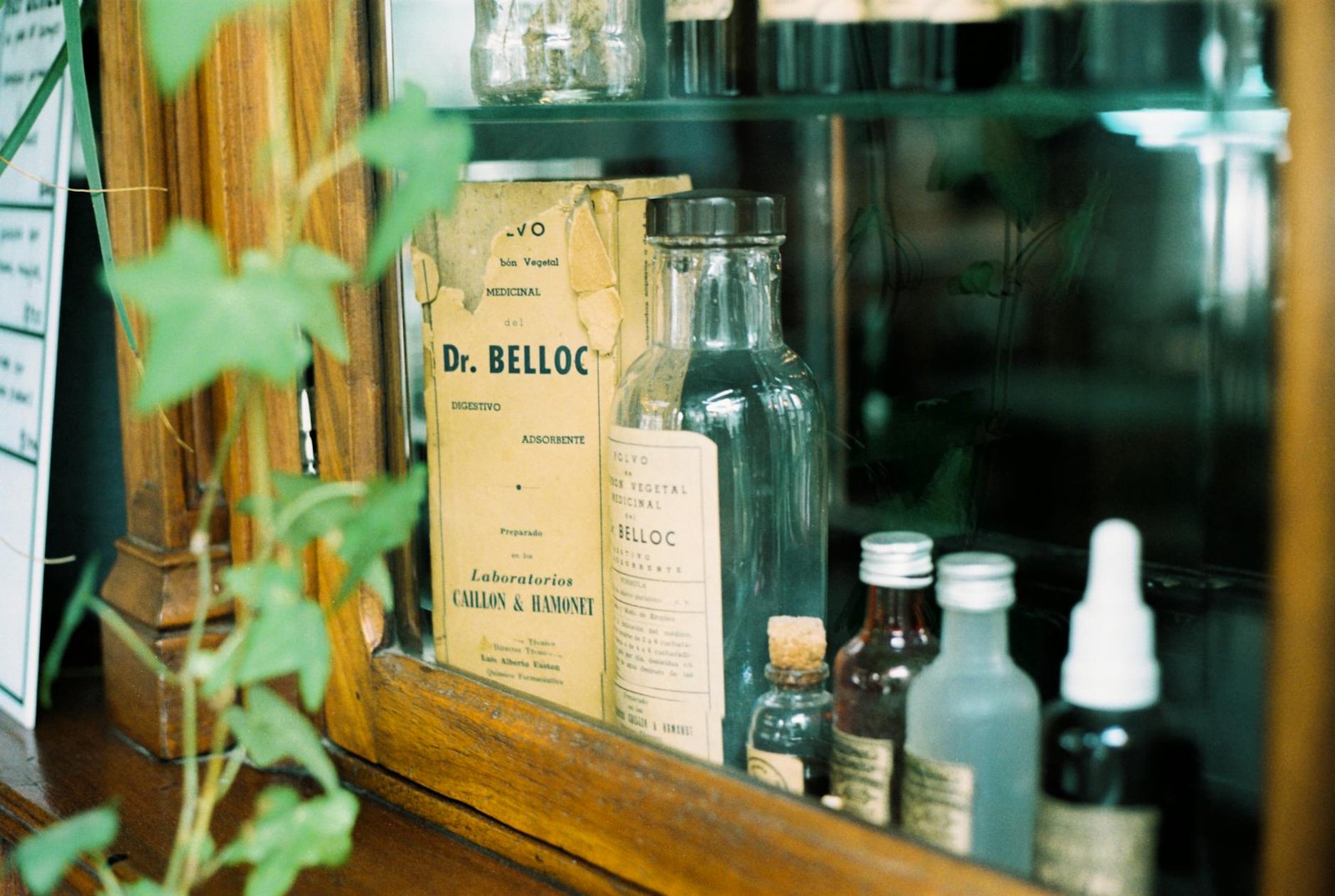 Empty medicine cabinet being cleaned and prepared for organization
