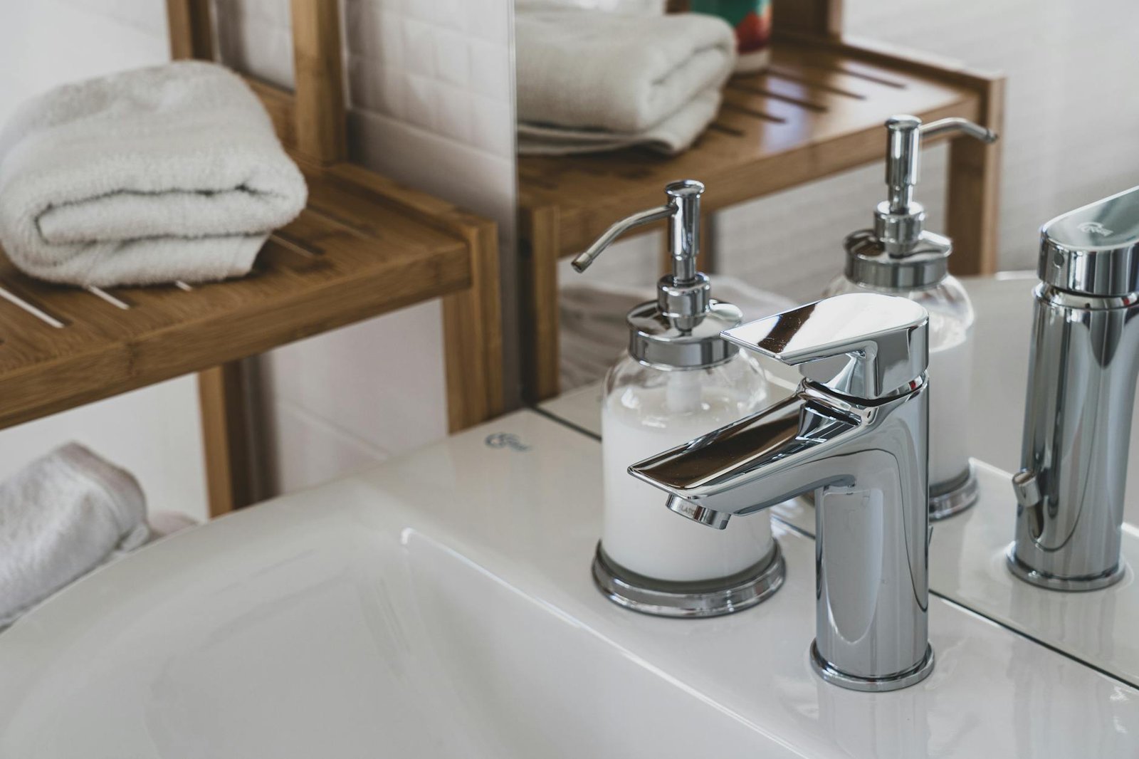 Before and after comparison of under-sink bathroom organization