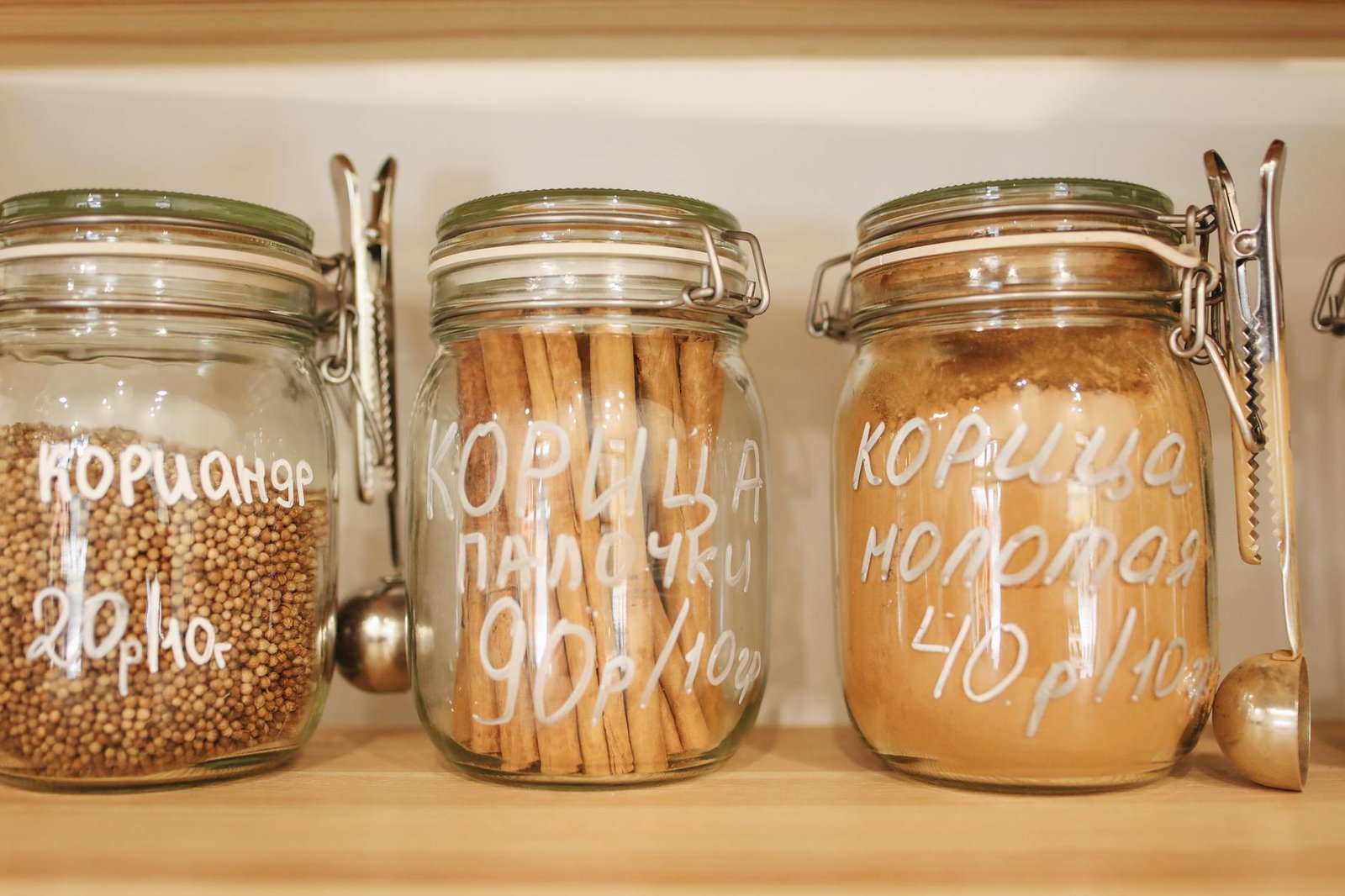 Spice jars grouped by cuisine type with clear labels