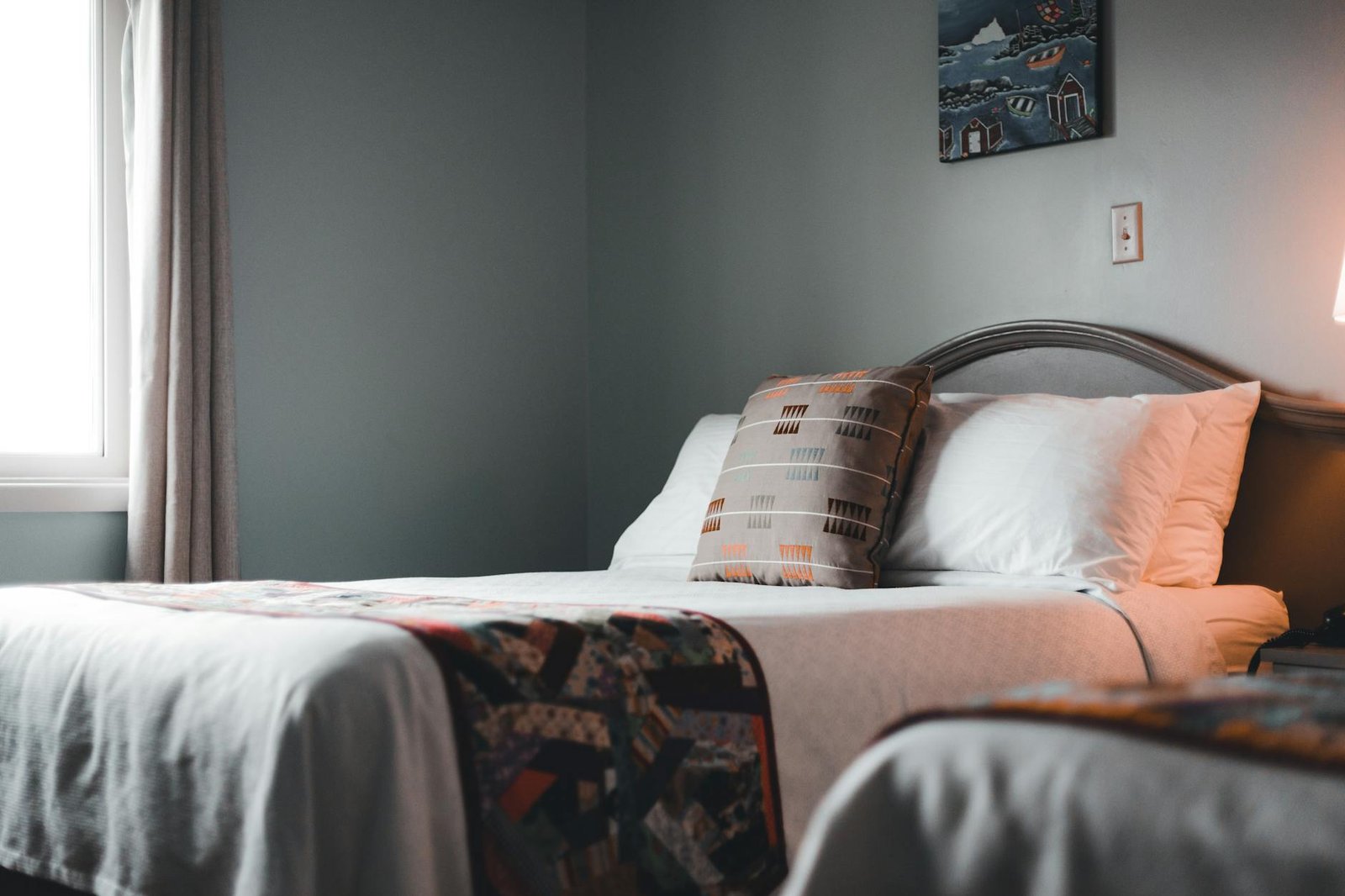 Serene bedroom corner with minimal decor and organized setup