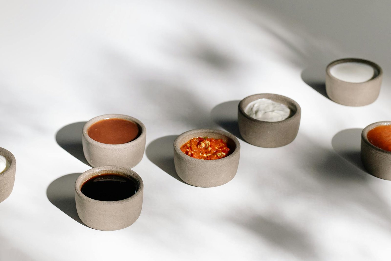 Using Decorative Bowls for Jewelry Organization Decorative bowls and dishes used for jewelry storage on dresser