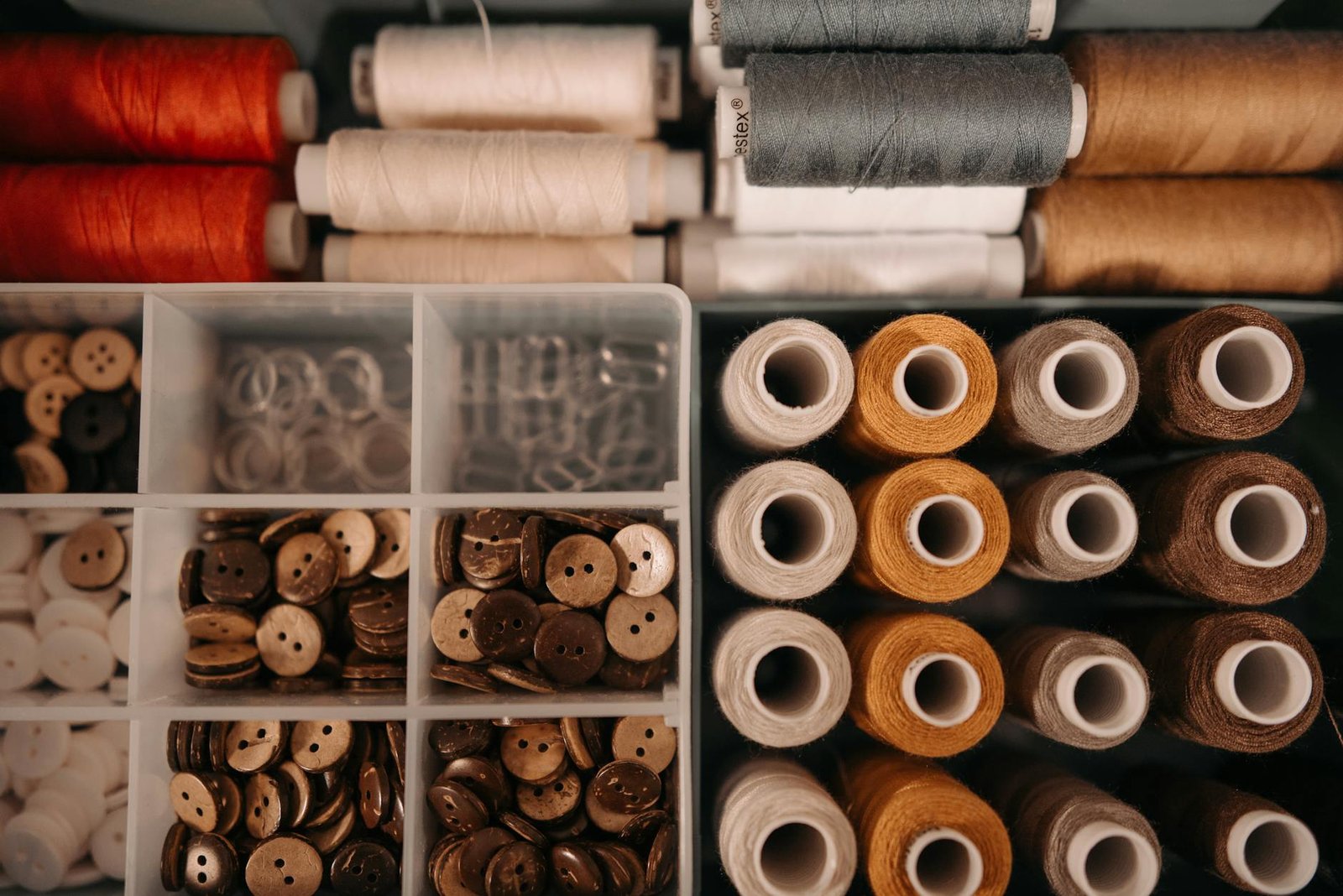 Drawer with fabric dividers showing organized sections for different types of undergarments