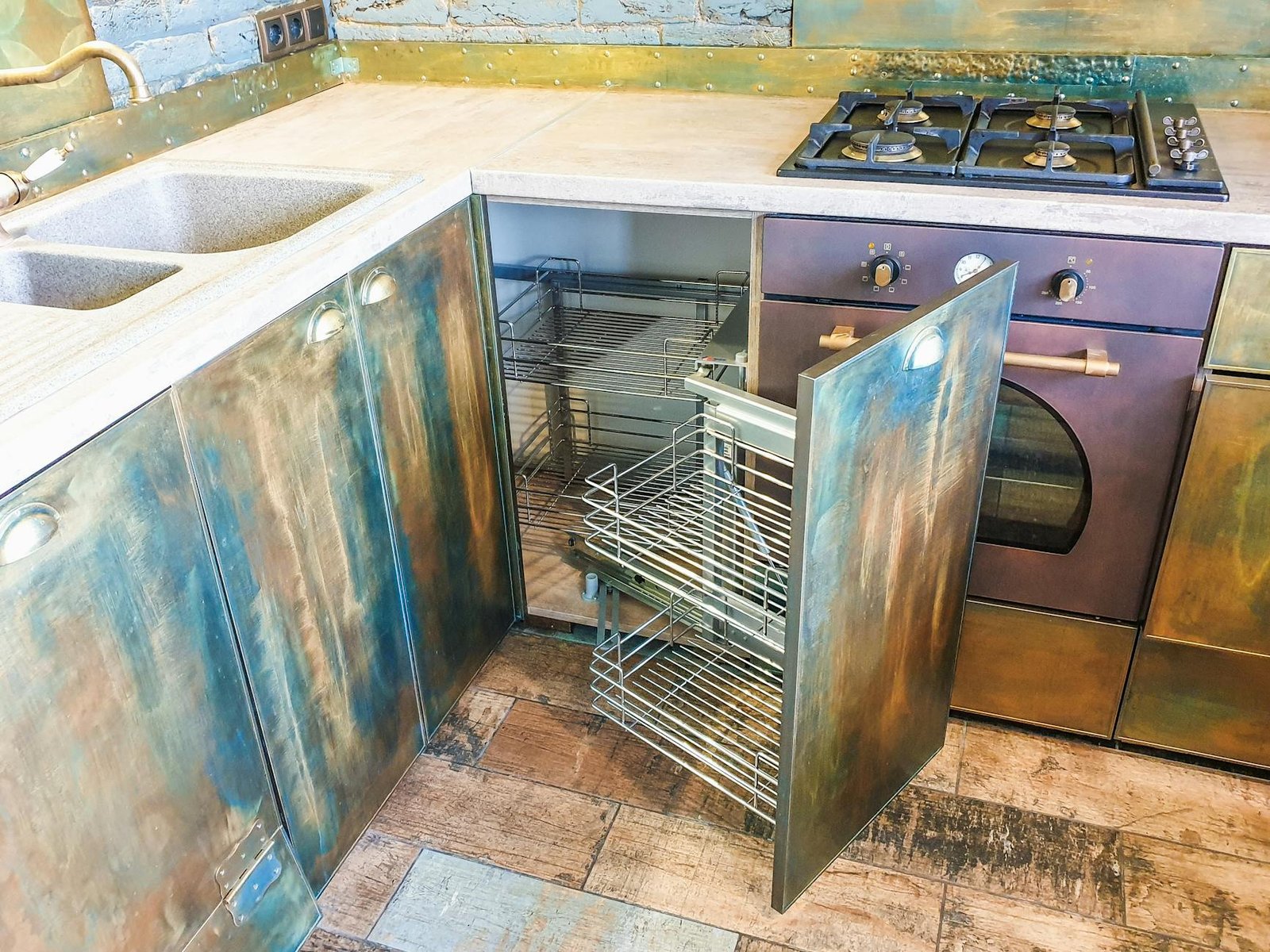 Sliding Drawer Organizers in Deep Cabinet Multiple sliding drawer organizers pulled out from deep kitchen cabinet